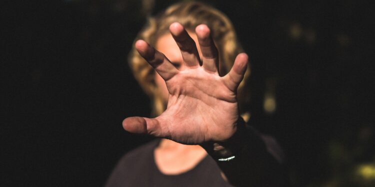 Male's Palm Of A Hand Covering His Face
