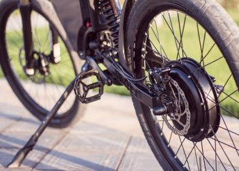 Electric Bike Motor Wheel Close Up With Pedal And Rear Shock Absorber
