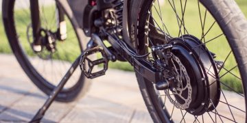 Electric Bike Motor Wheel Close Up With Pedal And Rear Shock Absorber