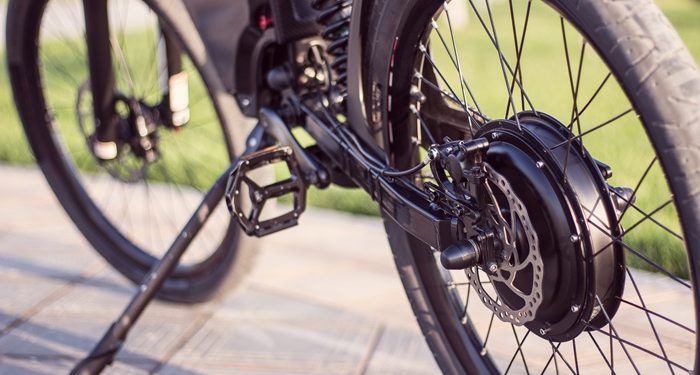 Electric Bike Motor Wheel Close Up With Pedal And Rear Shock Absorber